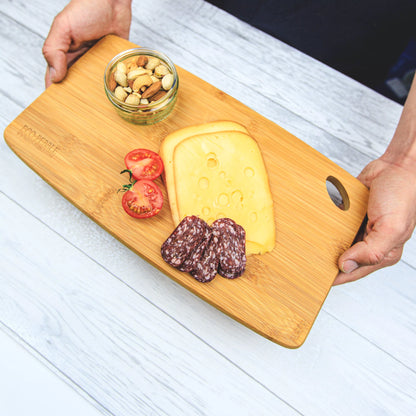 chopping board with cheese 